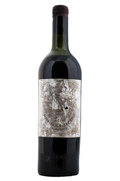Picture of 1929 Château Pichon Baron de Longueville, Grand Cru Classé Pauillac, slightly damaged label, high/top shoulder